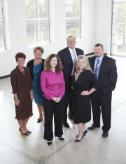 a group of people posing for the camera